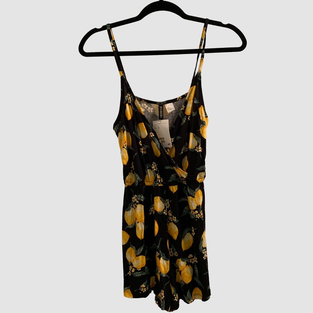 NWT Black romper with lemon print